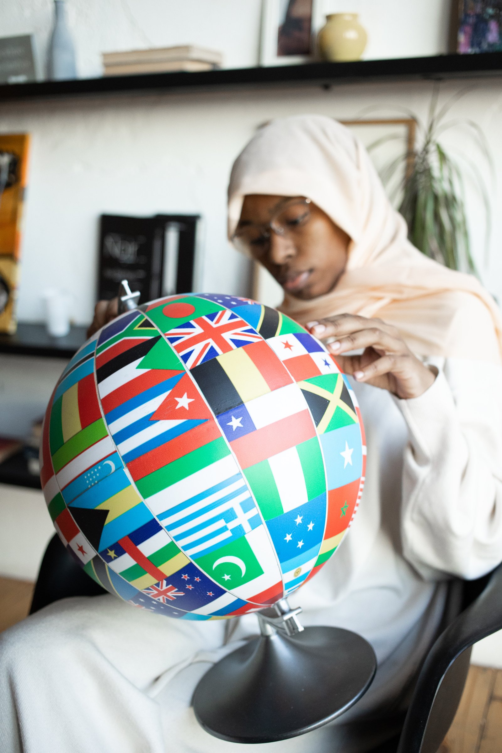 Girl holding a globe